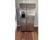 Stainless steel refrigerator with ice and water dispenser at 11331 Northern Ave, Leesburg, FL 34788