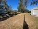 Spacious backyard with a detached shed and plenty of open space at 373 E Waldo St, Groveland, FL 34736