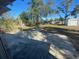 Concrete patio area in the backyard, offering additional outdoor space at 373 E Waldo St, Groveland, FL 34736