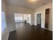 Bright dining room with hardwood floors and access to living room at 373 E Waldo St, Groveland, FL 34736