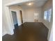 Formal dining room featuring hardwood floors and built-in shelving at 373 E Waldo St, Groveland, FL 34736