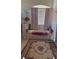Bathroom with a built-in bathtub and floral rug at 13026 Se 97Th Terrace Rd, Summerfield, FL 34491