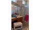 Clean bathroom with shower, vanity, and plenty of counter space at 13026 Se 97Th Terrace Rd, Summerfield, FL 34491