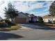 One-story house with a two-car garage and landscaped yard at 13026 Se 97Th Terrace Rd, Summerfield, FL 34491
