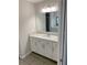 White vanity with quartz countertop and brushed nickel hardware at 6435 Sw 204 Ave, Dunnellon, FL 34431