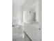 Bright bathroom featuring a soaking tub, vanity with marble countertop, and marble floors at 8570 Nw 31St Lane Rd, Ocala, FL 34482