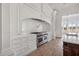 Kitchen features stainless steel appliances and hardwood flooring at 8570 Nw 31St Lane Rd, Ocala, FL 34482