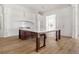 Kitchen features a large center island with hardwood flooring at 8570 Nw 31St Lane Rd, Ocala, FL 34482
