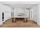 Spacious kitchen features a large island, wood floors, and modern appliances at 8570 Nw 31St Lane Rd, Ocala, FL 34482