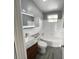 Modern bathroom featuring a sink, toilet, and tub with a showerhead at 2707 Illinois St, Orlando, FL 32803