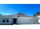 Charming single-story home with a two-car garage and well-maintained landscaping at 2026 Babbling Brook Blvd, Auburndale, FL 33823