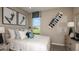 Inviting bedroom with a soft bed, calming colors, and unique decor making a comfortable retreat at 2136 Babbling Brook Blvd, Auburndale, FL 33823