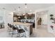 Kitchen featuring granite countertops, stainless steel appliances and breakfast bar seating at 921 Paradise Dr, Davenport, FL 33897