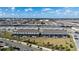 An aerial view shows the back of the new construction townhomes with private screened-in patios at 921 Paradise Dr, Davenport, FL 33897