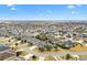 An aerial view of a home with a private backyard and many other homes in the neighborhood at 3303 Ridgewood Path, The Villages, FL 32163