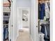 Walk-in closet featuring custom shelving for maximum storage and organization of clothes at 3303 Ridgewood Path, The Villages, FL 32163