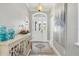 Elegant foyer with decorative console table and a stylish rug, creating a grand entrance to the home at 3303 Ridgewood Path, The Villages, FL 32163