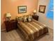 Comfortable bedroom with warm tones, providing a relaxing and inviting atmosphere at 4622 Warrington Dr, Orlando, FL 32826