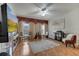 Bright living room with hardwood floors, neutral colors, and ample natural light at 603 Pinehurst Ct, Kissimmee, FL 34758