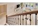 Bright open floor plan living room with a view from the stairs with modern decor and furniture at 1711 Laurel Glen Pl, Lakeland, FL 33803