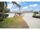 Charming single-story home featuring a well-manicured lawn and an attached two-car garage at 2378 Ridgeway Ct, The Villages, FL 32162
