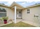 Inviting front entrance with decorative accents and well-maintained landscaping at 2378 Ridgeway Ct, The Villages, FL 32162