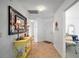 Entryway featuring a decorative mirror above a yellow table at 2378 Ridgeway Ct, The Villages, FL 32162