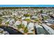 Panoramic aerial view of the community highlighting its waterfront location and many homes at 9000 Us Highway 192 # 242, Clermont, FL 34714