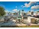 Waterfront home with a deck perfect for dining, relaxing, and enjoying picturesque views of the community at 9000 Us Highway 192 # 242, Clermont, FL 34714