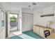 Bright room with lots of natural light, closet, storage cabinet, and outdoor access at 9000 Us Highway 192 # 242, Clermont, FL 34714