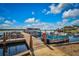 Community boat dock featuring wooden planks and boat slips, inviting residents to explore the waterways at 9000 Us Highway 192 # 242, Clermont, FL 34714