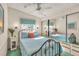 Charming bedroom featuring a queen-size bed, mirrored closet doors, and tasteful décor at 9000 Us Highway 192 # 242, Clermont, FL 34714