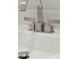Close up of modern bathroom sink with stainless steel faucet and stylish hardware at 103 S Flagler Ave, Edgewater, FL 32132