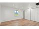 Spacious bedroom with wood flooring and ample closet space at 103 S Flagler Ave, Edgewater, FL 32132