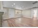 Spacious living room features new flooring and freshly painted walls at 103 S Flagler Ave, Edgewater, FL 32132