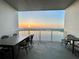 Relax on this outdoor balcony overlooking the lake; it's perfect for dining and entertaining guests at 13427 Blue Heron Beach Dr # 2106, Orlando, FL 32821
