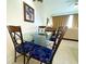 The dining room flows into the living room, offering a seamless, spacious, and inviting open layout at 13427 Blue Heron Beach Dr # 2106, Orlando, FL 32821