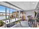 Fun game room with air hockey and arcade games near the pool with waterfront view from the large windows at 13427 Blue Heron Beach Dr # 2106, Orlando, FL 32821