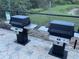 Convenient grilling area with two grills ready for outdoor cooking and entertainment at 13427 Blue Heron Beach Dr # 2106, Orlando, FL 32821