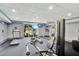 Contemporary gym featuring weight machines and treadmills, ideal for a comprehensive workout at 13427 Blue Heron Beach Dr # 2106, Orlando, FL 32821