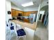 Kitchen featuring stainless steel appliances, granite countertops, and ample cabinet space at 13427 Blue Heron Beach Dr # 2106, Orlando, FL 32821