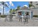 Stylish poolside bar offering drinks and snacks, complemented by comfortable outdoor seating at 13427 Blue Heron Beach Dr # 2106, Orlando, FL 32821