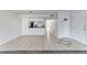 Clean kitchen with white cabinets, stainless steel appliances, and an island at 2735 N Poinciana Blvd # 103, Kissimmee, FL 34746