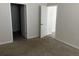Bedroom has neutral carpet and an open doorway at 357 Summershore Dr, Auburndale, FL 33823