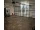 This garage is spacious and has a full sized refrigerator at 357 Summershore Dr, Auburndale, FL 33823