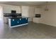 Open-concept kitchen with a large island, granite countertops, and stainless steel appliances at 357 Summershore Dr, Auburndale, FL 33823