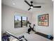 Bright exercise room with workout equipment and natural light at 1691 Chestnut Ave, Winter Park, FL 32789