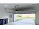 Spacious garage with automatic door opener, providing secure parking and storage space at 3842 Knotty Pine St, St Cloud, FL 34772