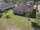 Aerial view of the home and neighborhood, highlighting the spacious lot and beautifully landscaped surroundings at 584 Aldenham Ln, Ormond Beach, FL 32174