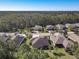 Aerial view of the property in a peaceful community and showcasing the landscape of central Florida at 584 Aldenham Ln, Ormond Beach, FL 32174